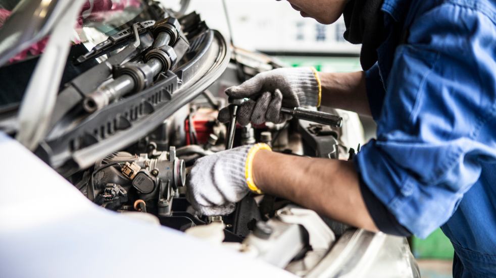 Should you buy a new or secondhand car car being serviced